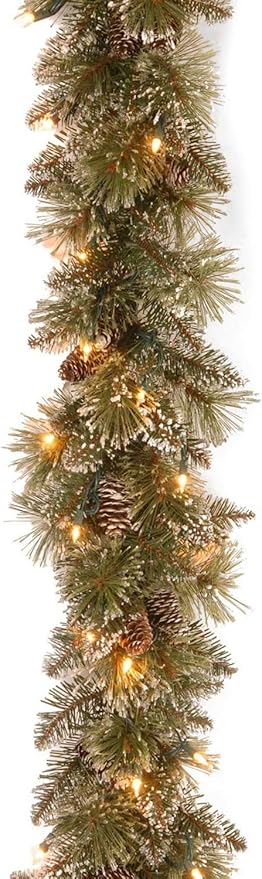 National Tree Company Pre-Lit Artificial Christmas Garland, Green, Glittery Bristle Pine, White Lights, Decorated with Pine Cones, Battery Operated, Christmas Collection, 6 Feet