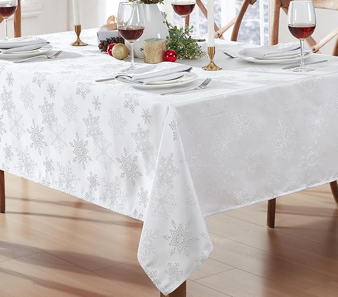 Newbridge Fancy Metallic Snowflake Christmas Fabric Tablecloth, 60 x 102 Inch Rectangle, White Silver, No-Iron Soil Resistant Sparkling Snowflakes Woven Holiday Table Cover