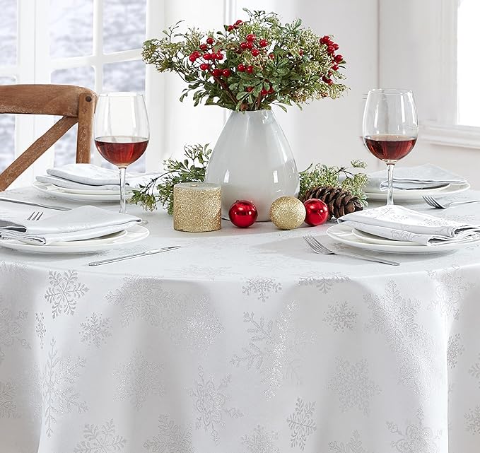 Newbridge Fancy Metallic Snowflake Christmas Fabric Tablecloth, 60 x 84 Inch Oval, White Silver, No-Iron Soil Resistant Sparkling Snowflakes Woven Holiday Table Cover