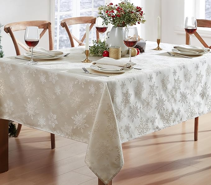 Newbridge Fancy Metallic Snowflake Christmas Fabric Tablecloth, 60 x 120 Inch Rectangle, Ivory Gold, No-Iron Soil Resistant Sparkling Snowflakes Woven Holiday Table Cover