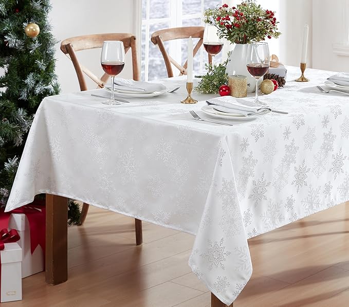 Newbridge Fancy Metallic Snowflake Christmas Fabric Tablecloth, 52 x 70 Inch Rectangle, White Silver, No-Iron Soil Resistant Sparkling Snowflakes Woven Holiday Table Cover