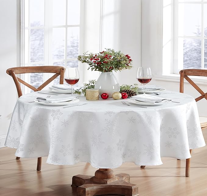 Newbridge Fancy Metallic Snowflake Christmas Fabric Tablecloth, 60 x 84 Inch Oval, White Silver, No-Iron Soil Resistant Sparkling Snowflakes Woven Holiday Table Cover
