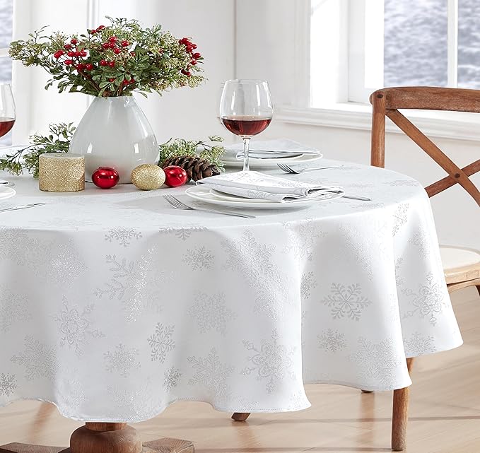 Newbridge Fancy Metallic Snowflake Christmas Fabric Tablecloth, 60 x 84 Inch Oval, White Silver, No-Iron Soil Resistant Sparkling Snowflakes Woven Holiday Table Cover