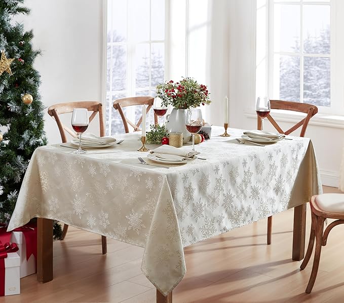 Newbridge Fancy Metallic Snowflake Christmas Fabric Tablecloth, 52 x 70 Inch Rectangle, Ivory Gold, No-Iron Soil Resistant Sparkling Snowflakes Woven Holiday Table Cover