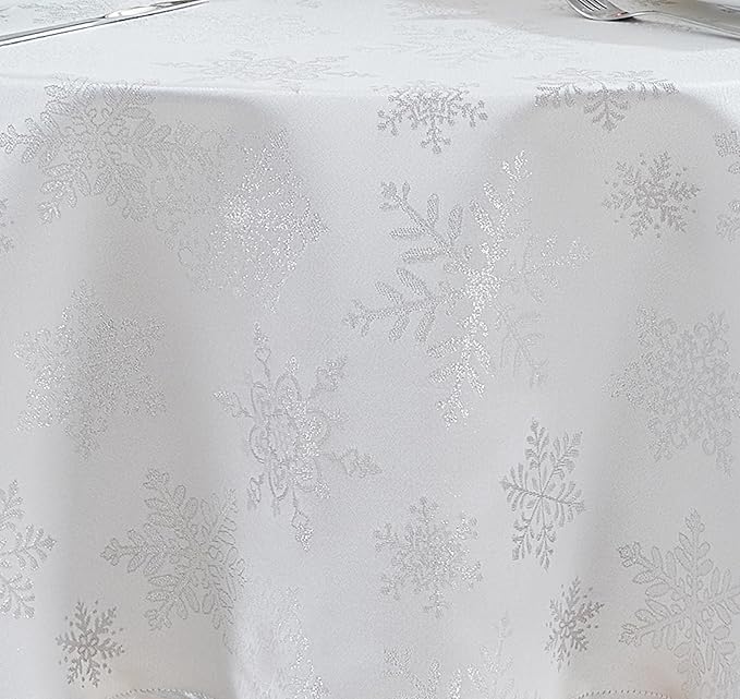 Newbridge Fancy Metallic Snowflake Christmas Fabric Tablecloth, 60 x 84 Inch Oval, White Silver, No-Iron Soil Resistant Sparkling Snowflakes Woven Holiday Table Cover